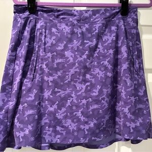 G/FORE Purple skulls golf skirt